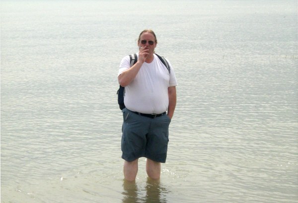 Paddling in the sea on the concrete apron of the old hoverport