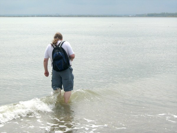 Paddling in the sea on the concrete apron of the old hoverport