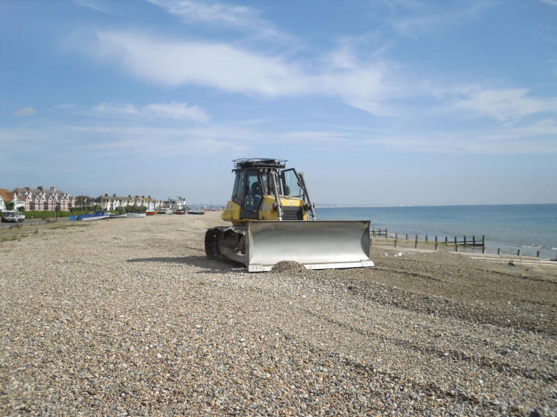 Bulldozing the shingle