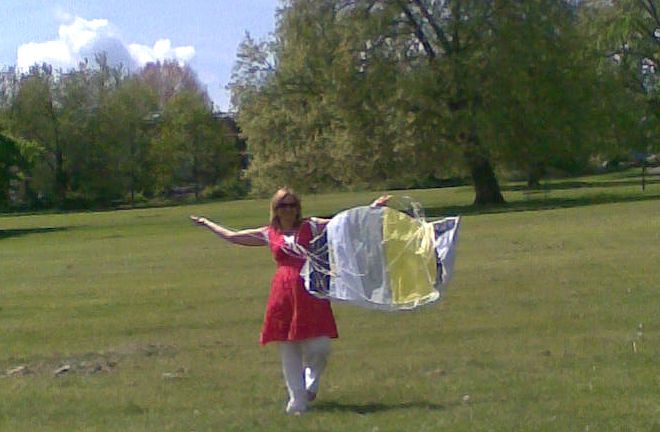 Patricia flying her kite, or attempting to.