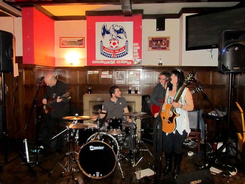 Playing under a Crystal Palace FC poster