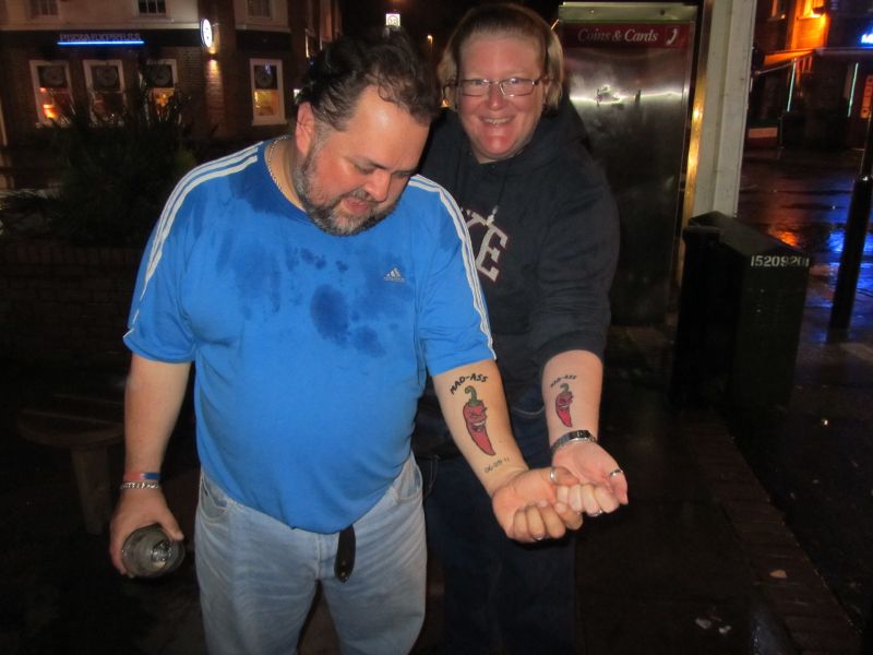 Dave and his missus show off their mad-ass tattoos