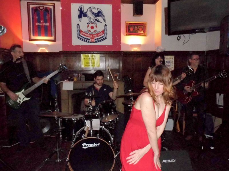 woman dancing in front of Chain