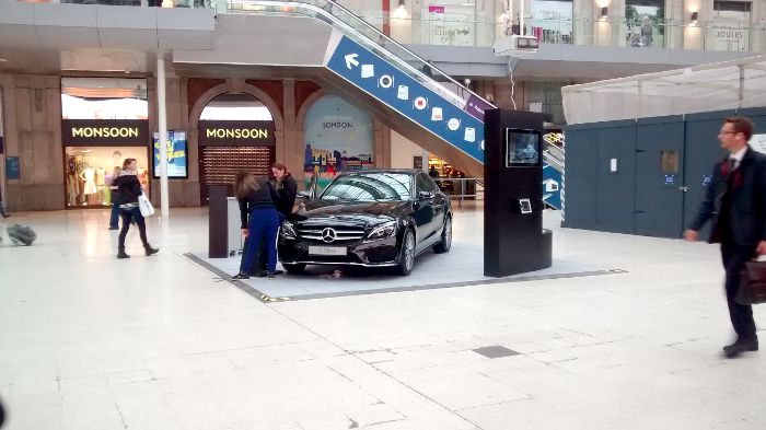 C-Class Mercedes Benz on Waterloo
                    station concourse 30th May 2014
