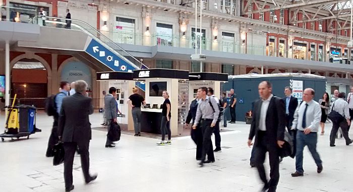 Asus on the concourse of Waterloo
                    station