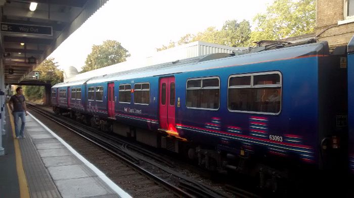 Looking south with a class 319 train
                    in Catford Bridge station