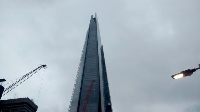 Looking up at The Shard from
                  platform 2 at London Bridge