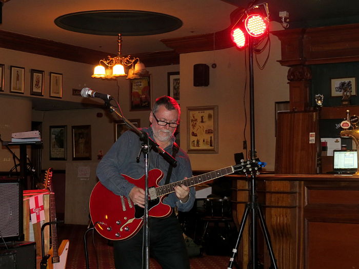 Chris Mayer and the red stage lights