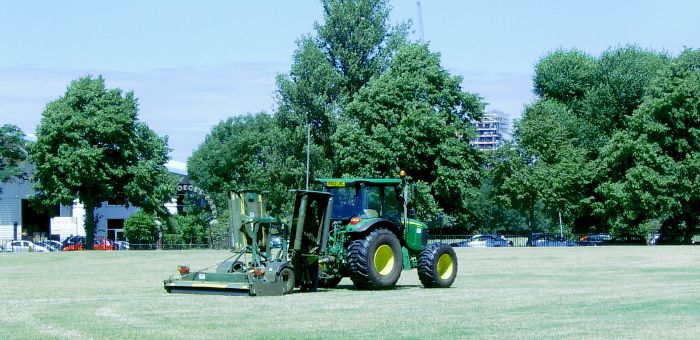 Tractor cutting the grass in St
                    George's Park