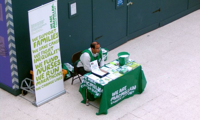 Macmillan on the concourse of
                    Waterloo station