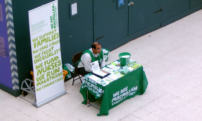 Macmillan on the concourse of
                    Waterloo station