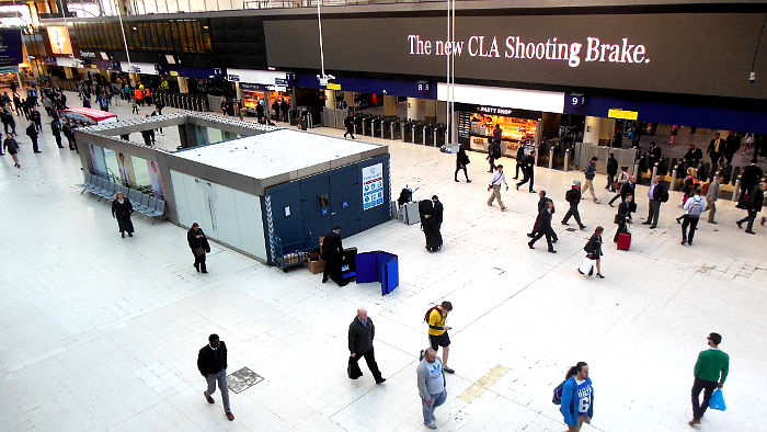 Waterloo
                            concourse, and a new display just starting
                            to be set up