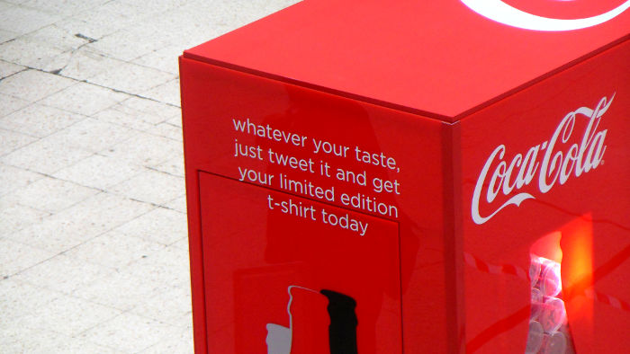 tweet your Cocal Cola message and win
                          a t-shirt