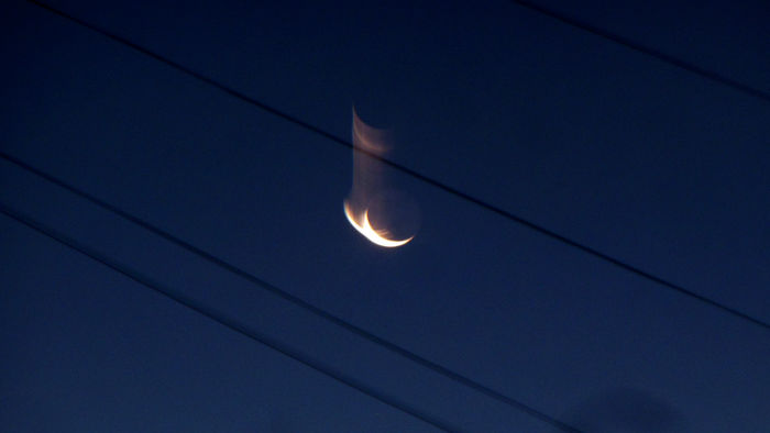 shaky image of the crescent
                  moon