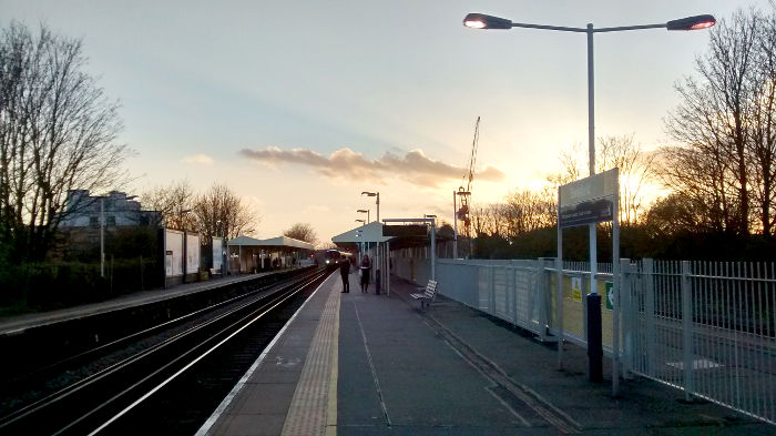 the sun starting to
                          set at Earlsfield station.