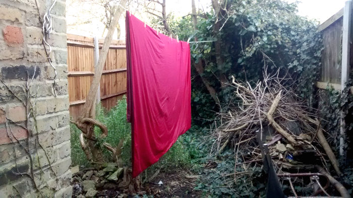 duvet cover drying
                          in the garden