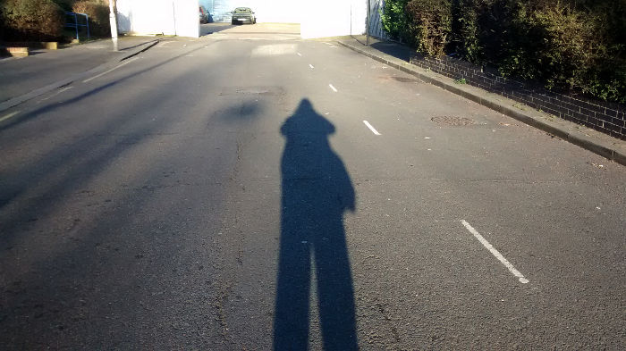 My shadow as I
                          approached work this April morning