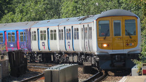 train approaching up platform
                                    at Catford Station