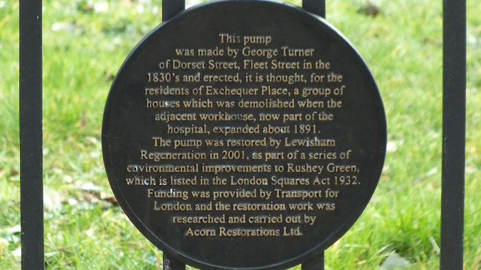 plaque describing preserved water
                              pump