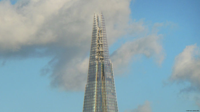 The Shard
                              looking "futuristic" in fron of
                              a cloudy blue sky