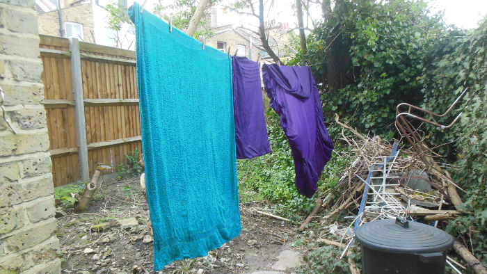 towel and sheets
                          drying on the washing line