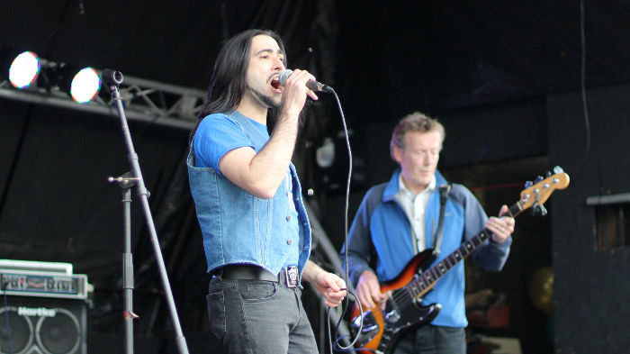 Tommy Erbi on
                          vocals, and Eamon O'Sullivan on bass guitar