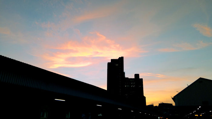 pink, orange, and red
                      clouds at sunset viewed from platform A at
                      Waterloo East station