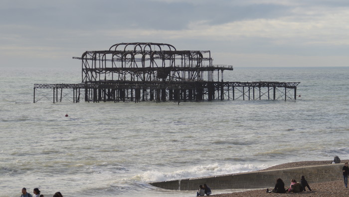 the burnt remains of the west pier at
                        Brighton