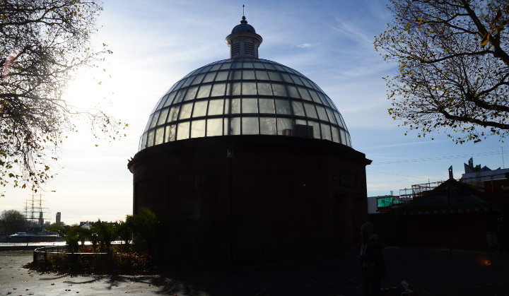 the Greenwich Foot Tunnel northern
                        portal back lit by the sun