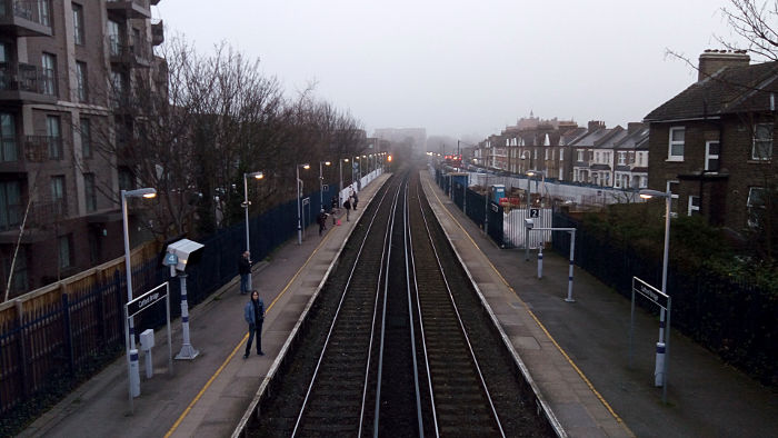 Looking north from Catford Bridge station to a
                  misty horizon