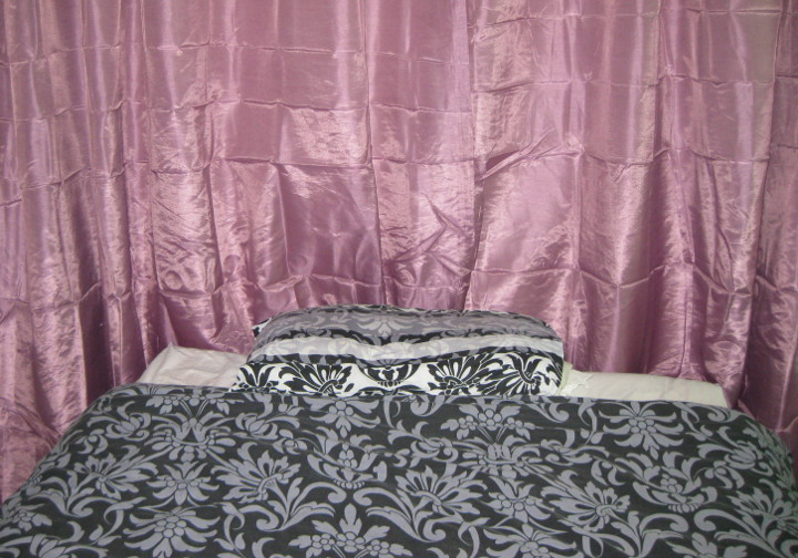 light purple, silky
                        looking curtains