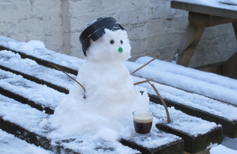 finished snowman with his glass of
                      Guinness