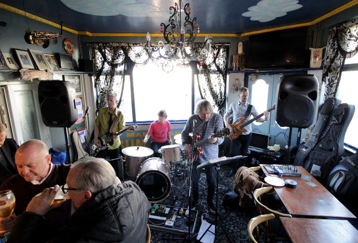 wide angle lens shot
                        of The Belles