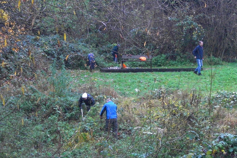 volunteers cleaning up
                        the river banks