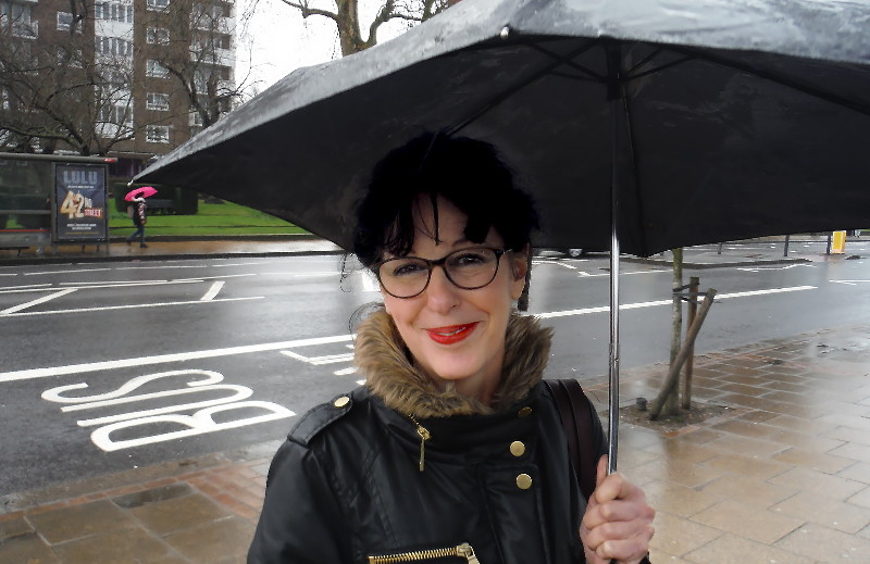 Angela in the rain
                        with a lovely natural smile