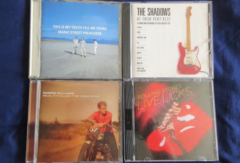 4 CDs bought in a
                      charity shop for 99p each