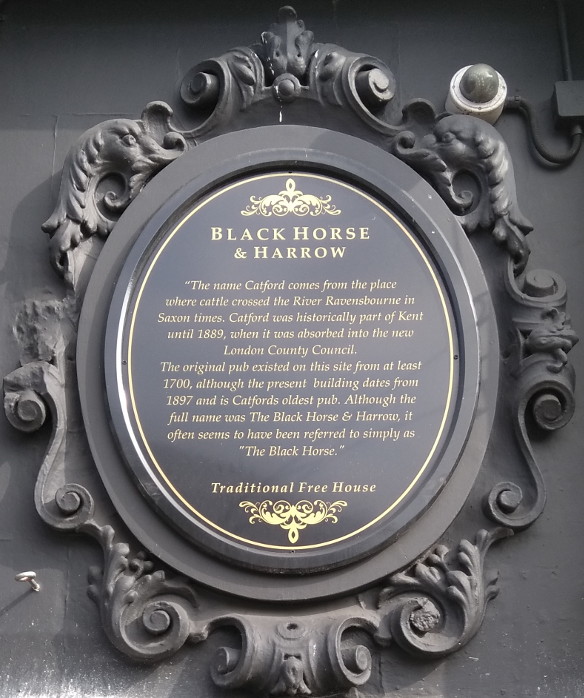 plaque outside the pub that acknowledges
                    it's original name