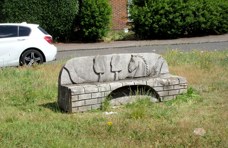 another
                                  carved wooden settee/bench