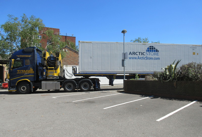 emergency freezer shipping
                                      containers being taken away