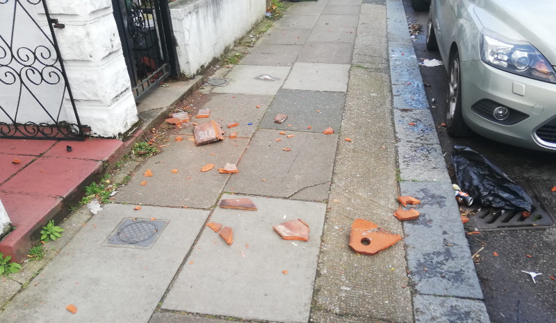 roof tiles
                                    blown off onto the road