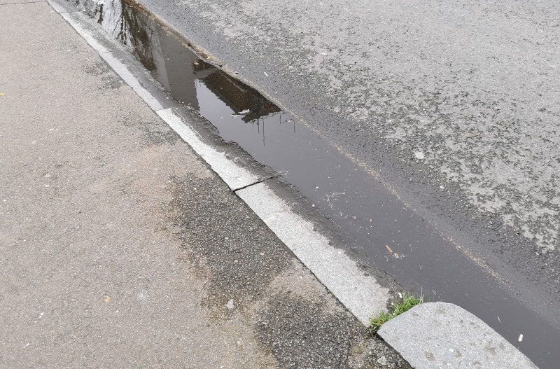 dropped kerb
                              with slippery granite