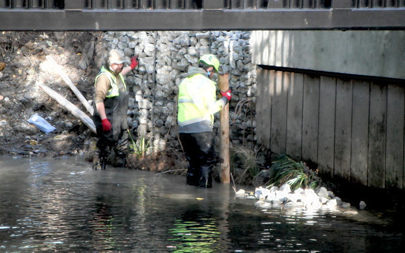 men at
                                      work in the river