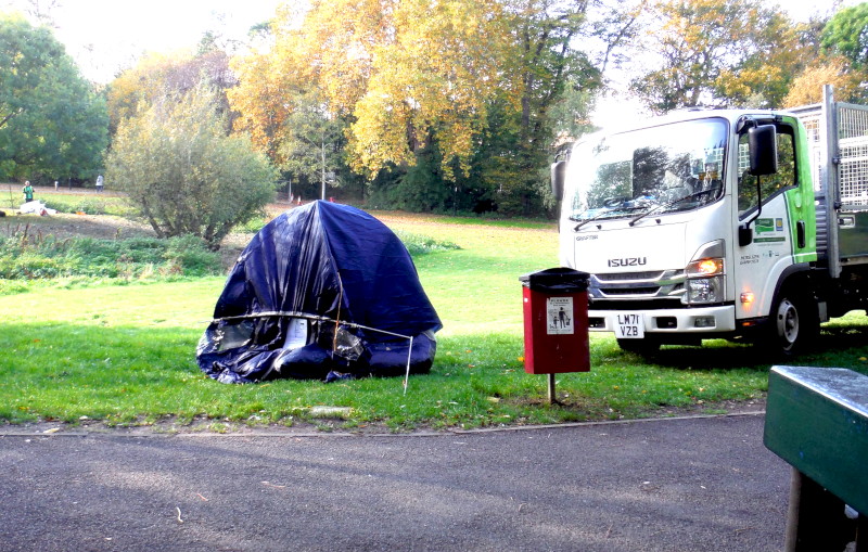 park
                                      keepers removing a tent