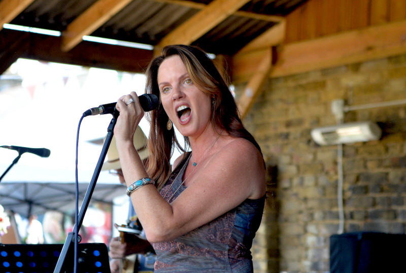 Miranda at the
                                          microphone