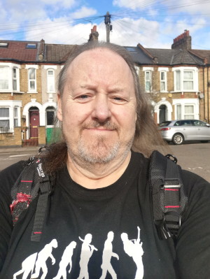 no coat and blue sky
                                        behind me