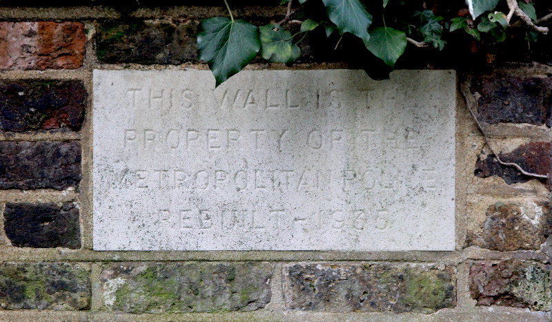 wall
                                          owned by Met Police